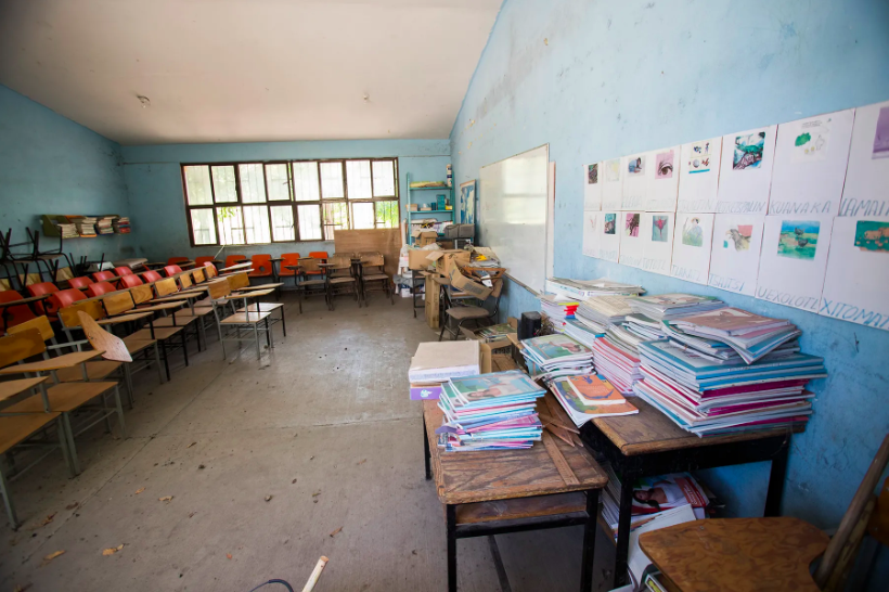 A classroom in Quetzalcoatlán de las Palmas remains empty. The teacher seldom visits after violence ravaged the community in 2016. Image by Omar Ornelas. Mexico, 2019.
