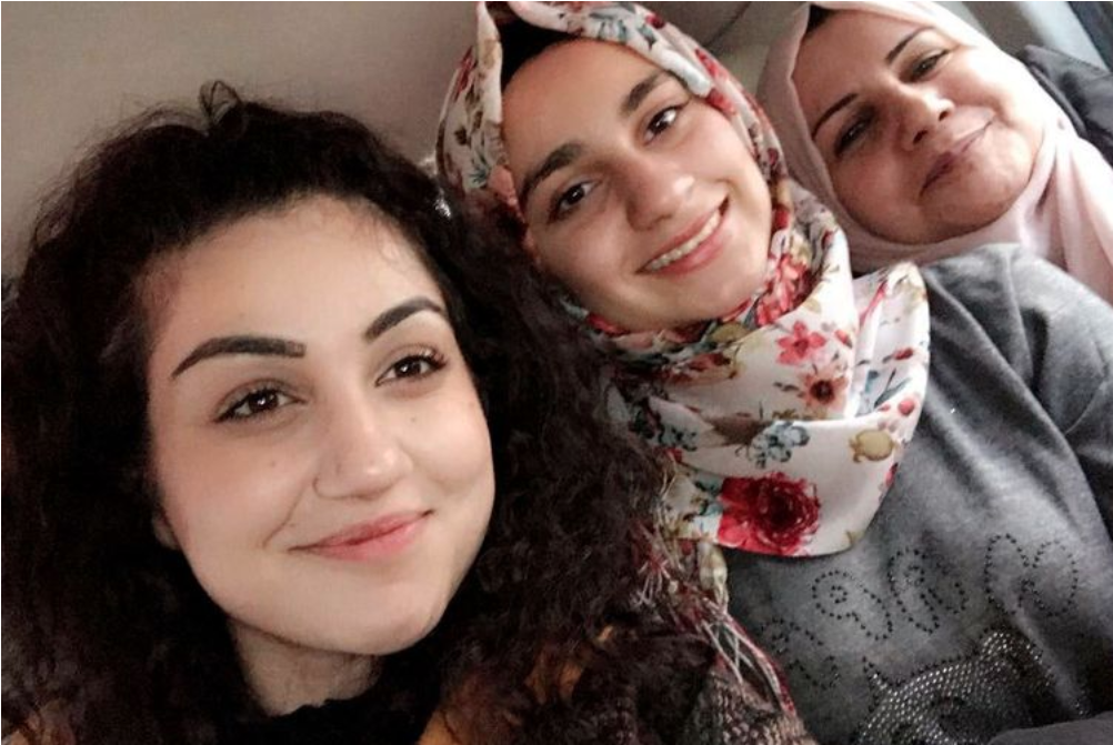 Zahra Ahmad, 24, takes a selfie with her cousin Estabrek Ahmad, 18, and her aunt Samira Sibte on their way to a mall in Baghdad, Iraq. Image by Zahra Ahmad. Iraq, 2019.