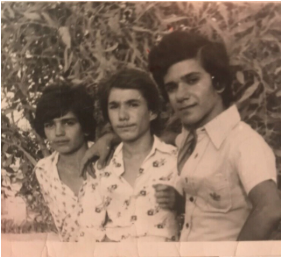Mohmammad Sibte, far left, poses for a picture with his cousins in Mandali, Iraq. Image courtesy of Ahmad family.