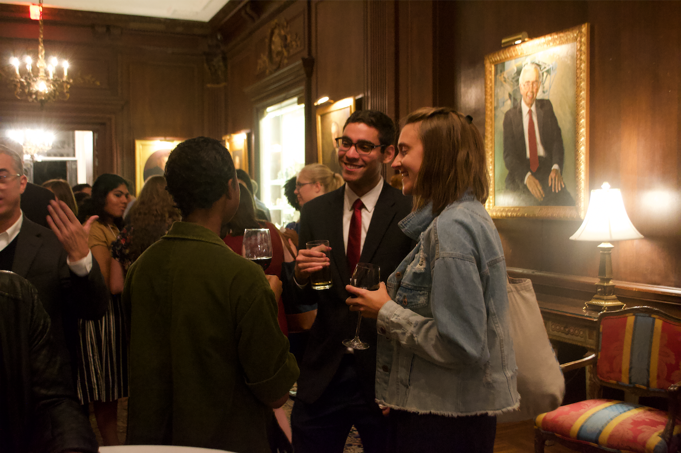 Rafael Alves de Lima (Wake Forest University) and Liz Weber (American University) mingle during the Cosmos Club reception. Image by Nora Moraga-Lewy. United States, 2019. 

