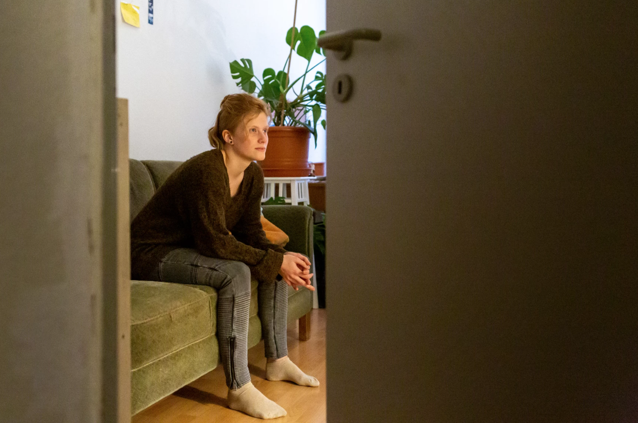 Anika Färber, a youth trainer with the Network for Democracy and Courage in Germany, at her home in Erfurt, Germany. Image by Ryan Delaney/St. Louis Public Radio. 