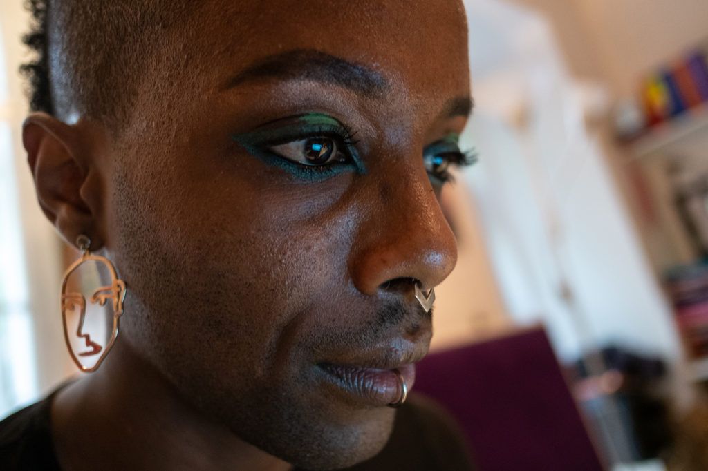 Faris, 35, from Addis Ababa, Ethiopia, identifies as non-binary, and now lives in Vienna, Austria, where they were granted political asylum in July 2017. Image by Bradley Secker. Austria, 2020.
