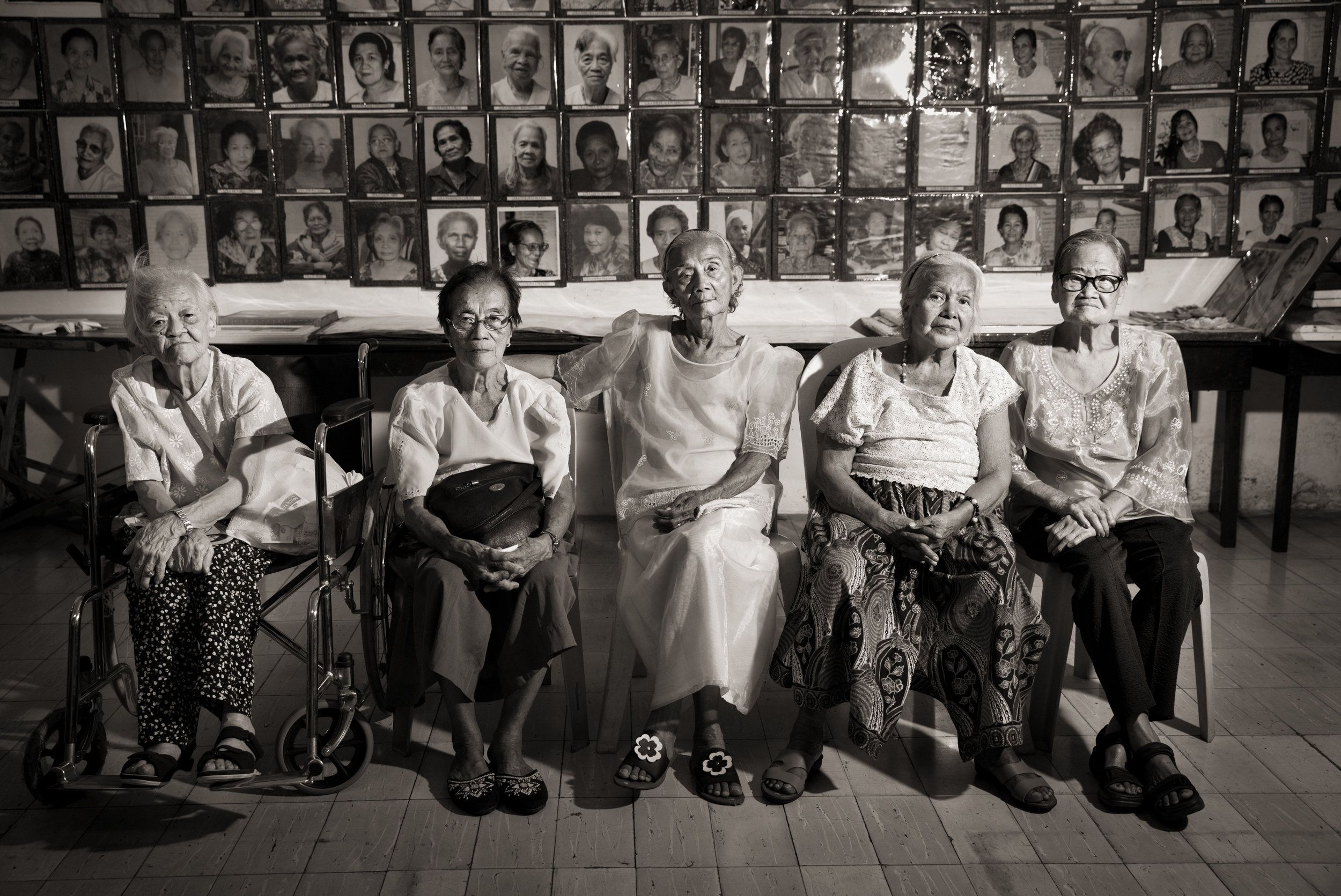 Remedios Tecson (from left), sisters Estela Adriatico and Narcisa Claveria, Felicidad delos Reyes and Estelita Dy were teens when they were sexually enslaved. Many of the estimated 1,000 Filipinas who served as "comfort women" died of injuries or illness. Survivors suffered from post-traumatic stress disorder. Many went on to marry but said their wartime experiences made them societal outcasts. Image by Cheryl Diaz Meyer. Philippines, 2019.