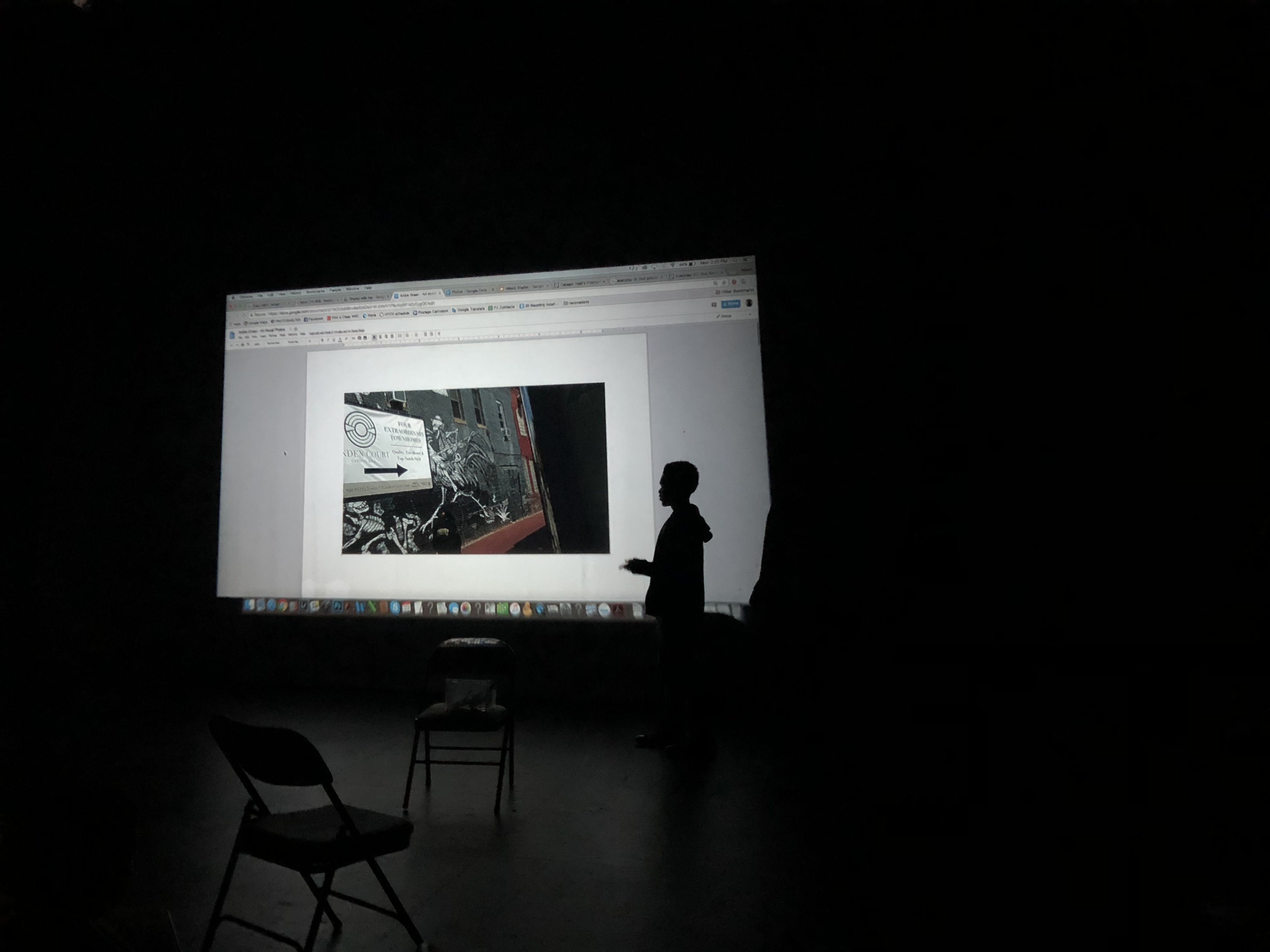 A student journalist in the Soul of the City program presents his progess on a photography project during a Pulitzer Center journalist visit. Image by Kayla Edwards. United States, 2018. 