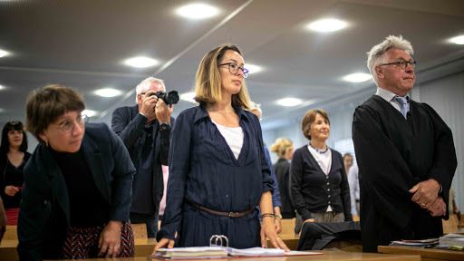 Leading members of the Bavarian Refugee Council stand in a courtroom before representatives of the Bavarian government to address their case against the government’s ban, regarding access into the ANKER centers. Image by Angelica Ekeke. Germany, 2019.