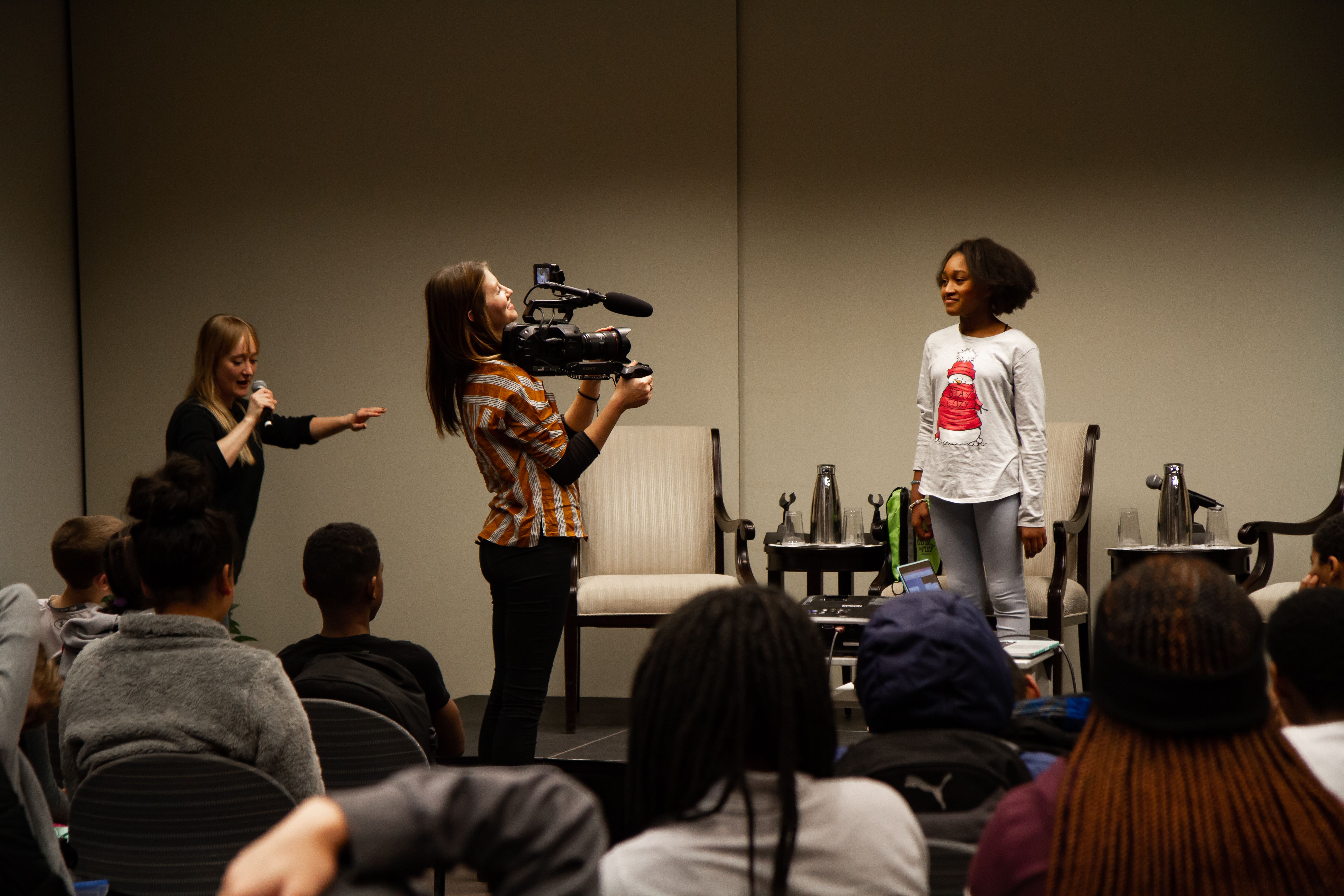 A volunteer student helps the filmmakers demonstrate a scene breakdown. Image by Claire Seaton. Washington, D.C., 2018.