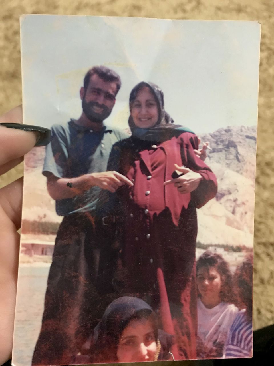 A photo of Lamiya Mahdi, right, and Mohammad Sibte, left, in 1995. Lamiya is pregnant with Zahra Ahmad who was born August, 6, 1995. Image courtesy of Ahmad family. 