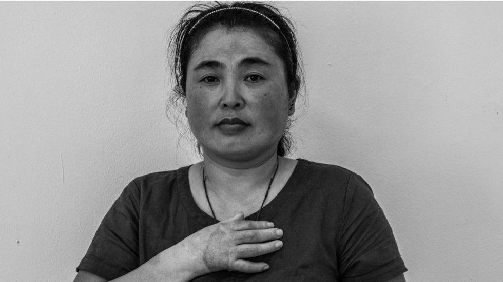 Noodle factory Xi Feng from China had only been in Singapore for 25 days when she was injured at work. The agency responsible for her refused to pay her back, she said. Image by Xyza Bacani. Singapore, 2017.