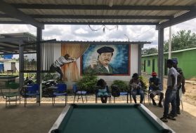 Former FARC members living in transition zones have painted their homes and public areas with colourful murals of the group's leaders, like this one in Tumaco. Image by Mariana Palau/TNH. Colombia, 2019.