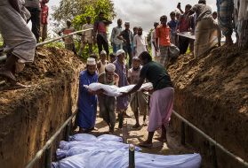 Bengali residents from the nearby Inani village donated the land and dug the mass grave for the 15 bodies recovered near their Inani Beach. Of the more than 100 Rohingyas from a boat that had capsized in the Bay of Bengal, only 17 people survived. Image by Patrick Brown/Panos Pictures/UNICEF. Bangladesh, 2017.

