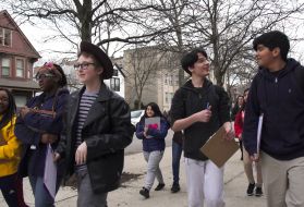Students roam a Chicago neighborhood as part of Out of Eden Walk-Chicago. Image by Lorraine A. Ustaris. United States, 2018.