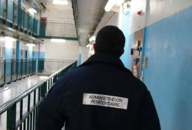A warder patrolling a cell block at Fresnes, one of France’s biggest jails, during a visit I made earlier this month. Image by Christopher de Bellaigue. France, 2016.