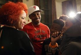 Nikole Hannah-Jones talks with a student at the University of Chicago's Institute of Politics 1619 event. Image by Dylan Burrus, Courtesy of the University of Chicago's Institute of Politics. United States, 2019. 