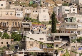 Murals of eyes look out from across the Wadi Hileh area in the Palestinian neighbourhood in Silwan. Image by BBC News Arabic.