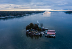 Dollar Island at Les Cheneaux Islands on Lake Huron in the Upper Peninsula of Michigan on Nov. 20, 2019. Kenneth Kloster Sr., also known as " Captain Ken," bought the island in 1981 right before the record-setting high water levels of 1986. Image by Zbigniew Bzdak / Chicago Tribune. United States, 2020.